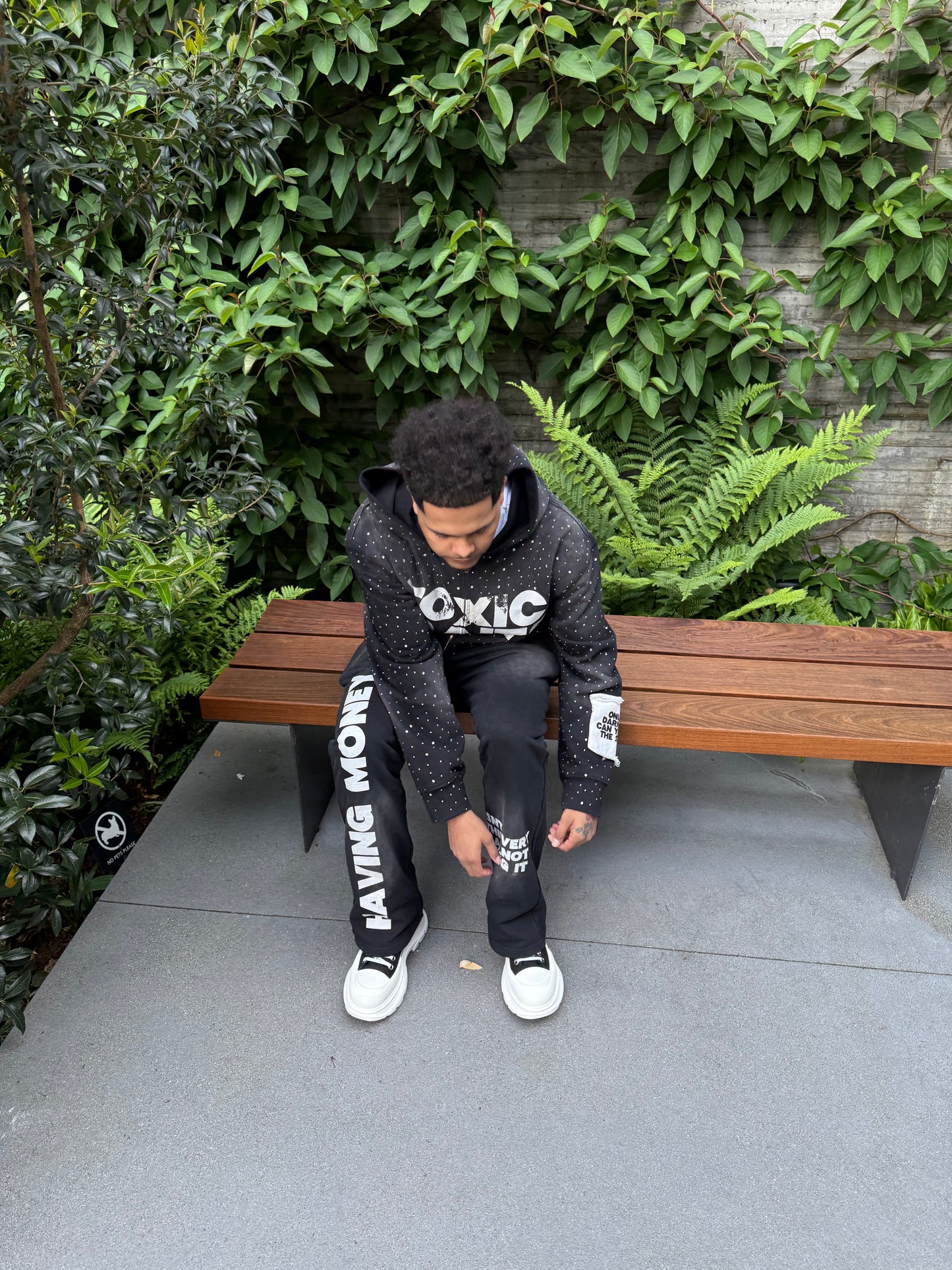 “MONEY ISN’T EVERYTHING” FLARE PANTS