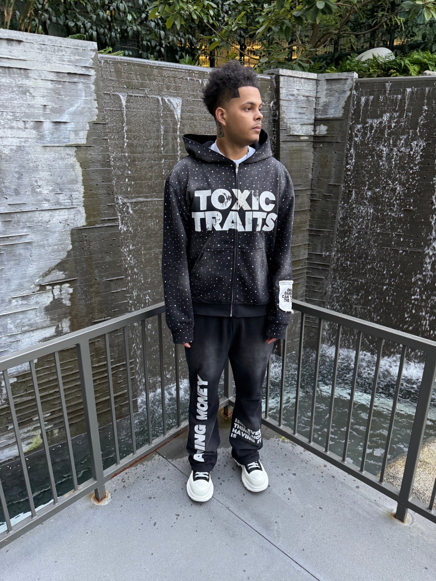 “TOXIC TRAITS” ZIP HOODIE